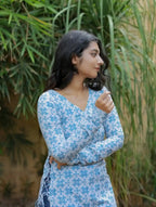 Dusky White With Bluebird Blue Printed Swiss Cotton