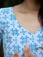 Dusky White With Bluebird Blue Printed Swiss Cotton